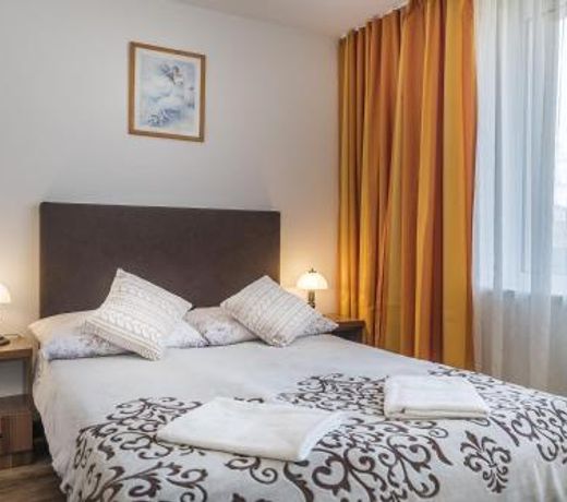 Pokoje i Apartamenty Poducha