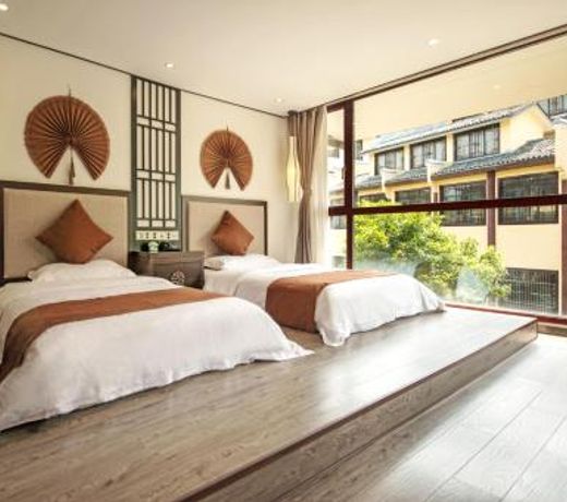 Peach Blossom Resort Hotel (near Reed Flute Rock, free pick up for min 3 nights)