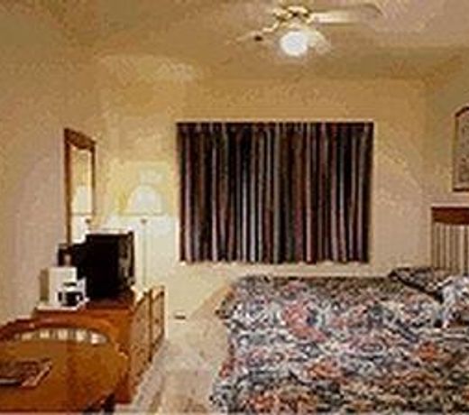 TUDOR HOTEL AND SUITES