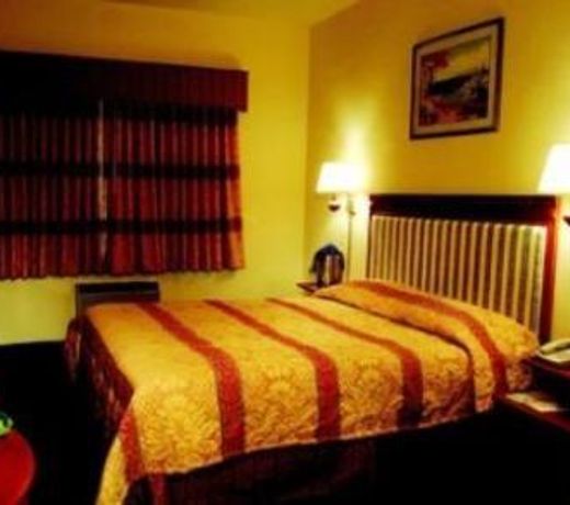 TUDOR HOTEL AND SUITES