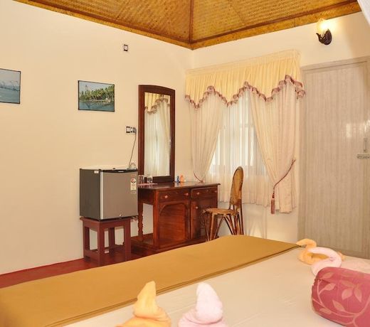 Maadathil Cottages