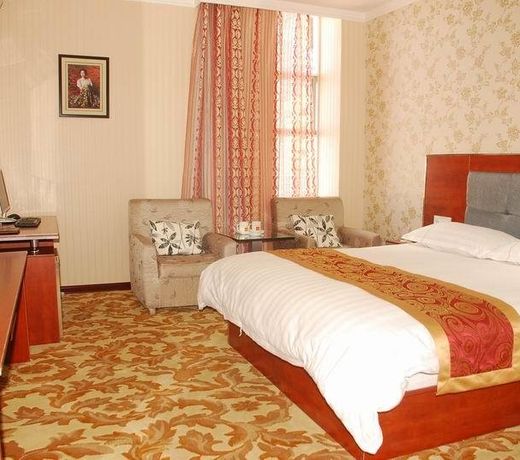 Jiuquan Zhenhao 6+1 Business Hotel
