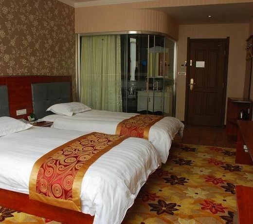 Jiuquan Zhenhao 6+1 Business Hotel