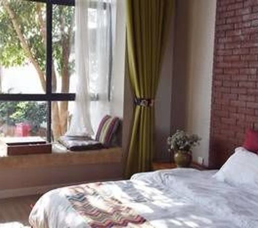 Baicaoyuan Theme Inn