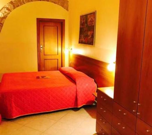 Corato room economy