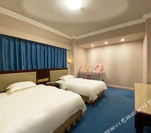 Xinhaorun Holiday Hotel Haotong Building (Zhuhai Gongbei Port)