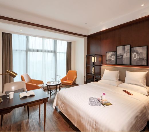 Maison New Century Hotel