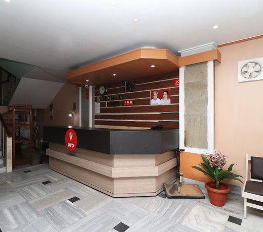 Capital O 7933 Hotel Trimurty International