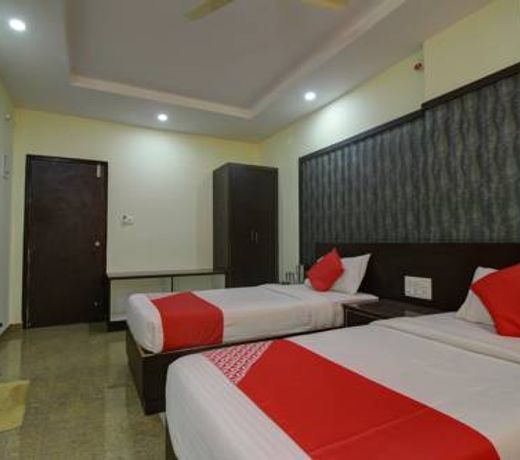 OYO 18410 Shree Sapthakoti Residency Parraadise Lodge