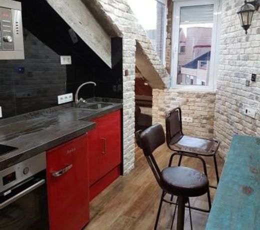 Tiny and cute apartment in the roof touching border