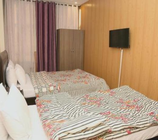 Swiss Cottage Economy Living