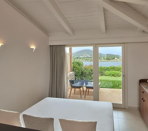 Baia di Chia Resort Sardinia, Curio Collection by Hilton