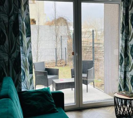 Apartament z ogródkiem i garażem