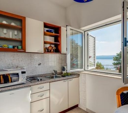 Family friendly apartments with a swimming pool Lokva Rogoznica, Omis - 11931