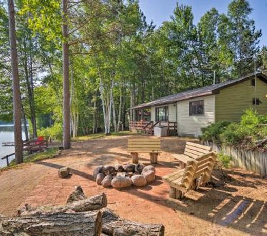 Lakefront Manistique Cabin with Private Dock and Fire Pit