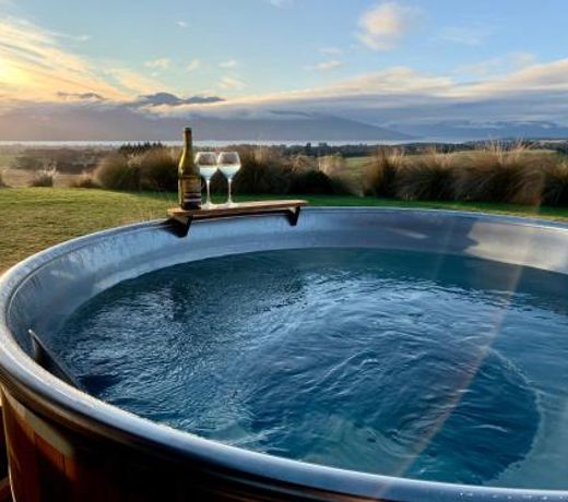 Fiordland Eco-Retreat -- Panoramic Views -- Hot Tub