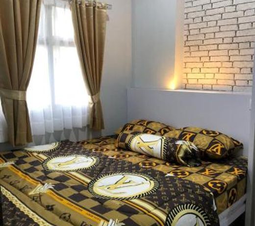 The Suite Metro Apartement by King