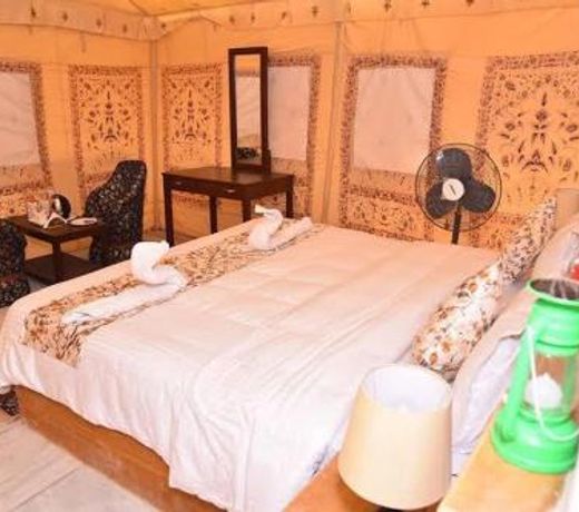 golden sandstone hotel desert Safari camp