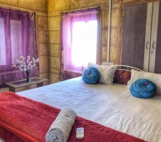 golden sandstone hotel desert Safari camp