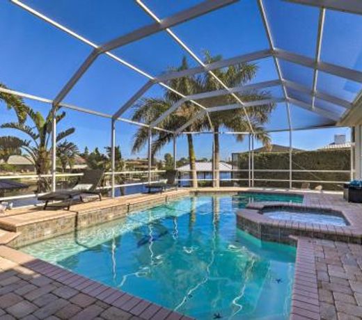 Elegant Waterfront Oasis with Pool and Boat Dock!