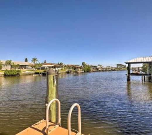Elegant Waterfront Oasis with Pool and Boat Dock!