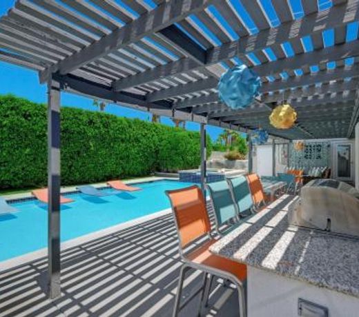 Teal and Tangerine Retreat by Oranj Palm