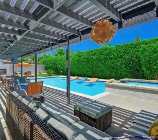 Teal and Tangerine Retreat by Oranj Palm