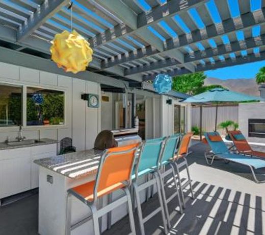 Teal and Tangerine Retreat by Oranj Palm