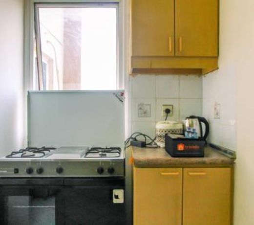 Comfy Studio at Menara Kondominium Kelapa Gading Apartment By Travelio