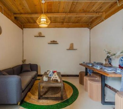 Dujiangyan CityÂ·South Bridge of Xuanhua Gate Locals Apartment 00140350