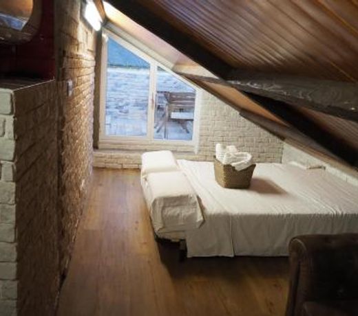 Tiny and cute apartment in the roof touching border