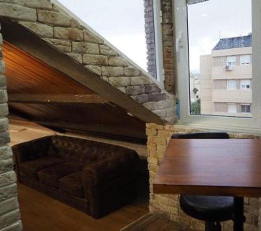 Tiny and cute apartment in the roof touching border