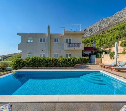 Family friendly apartments with a swimming pool Lokva Rogoznica, Omis - 16429