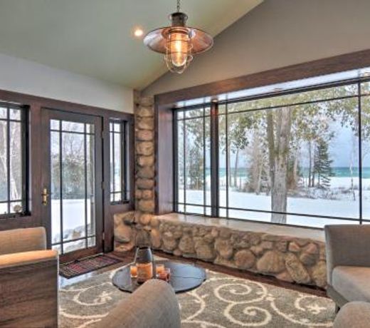 Upscale Earl Young Charlevoix Cottage with Deck