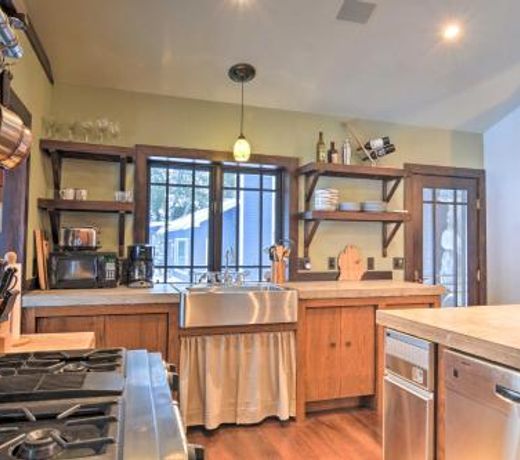 Upscale Earl Young Charlevoix Cottage with Deck