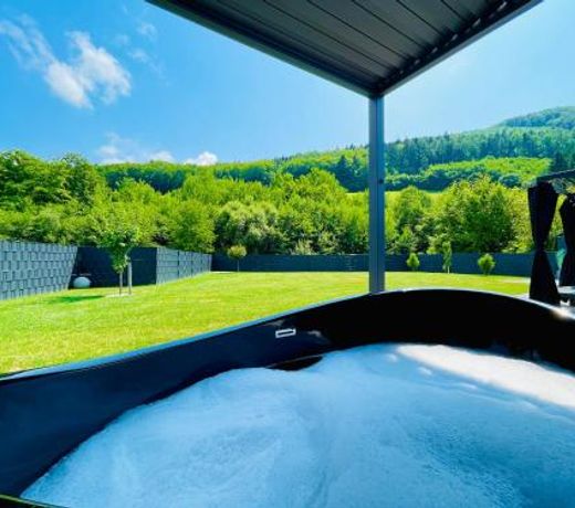 Voralpen Lodge - Ferienhaus mit Wellnessbereich