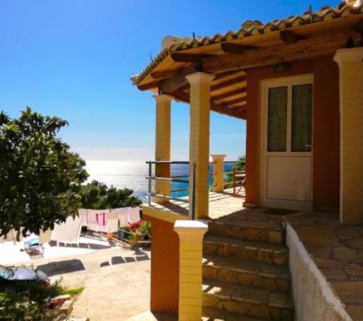 Villa Takis on Pelekas beach Small house with garden and sea view