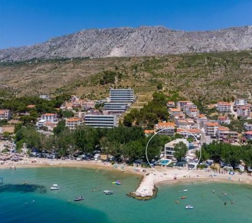 Beachfront Villa Erce with private 40sqm heated pool, a Gym, 7 en-suite bedrooms, a rooftop terrace, 2 living areas