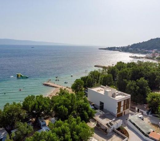 Beachfront Villa Erce with private 40sqm heated pool, a Gym, 7 en-suite bedrooms, a rooftop terrace, 2 living areas