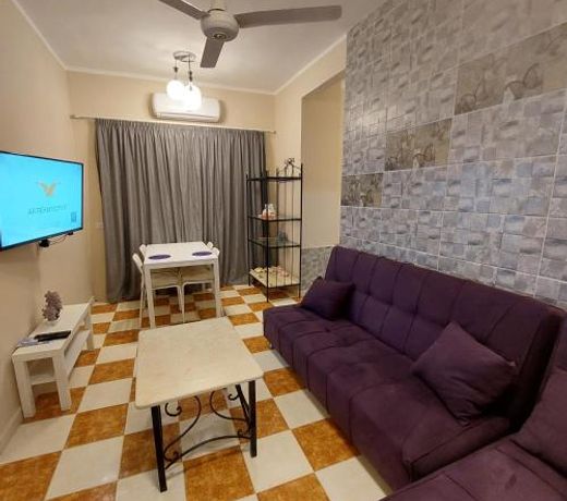 Coral flat with 2 bedrooms and 3 balconies .
