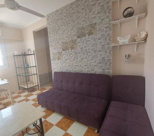Coral flat with 2 bedrooms and 3 balconies .
