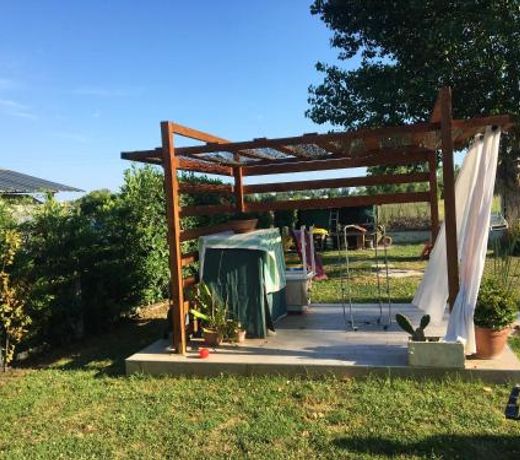 2 bedrooms appartement with enclosed garden and wifi at Cioccatelli 1 km away from the beach