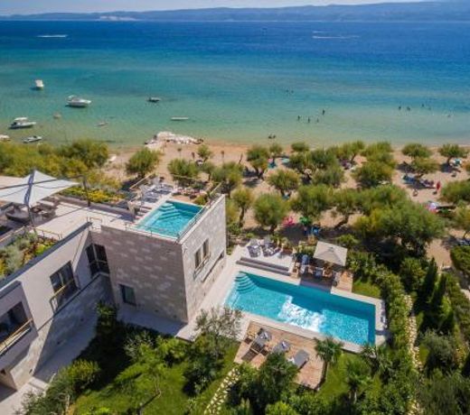 Luxury beachfront VILLA FLORES heated outdoor, indoor pool, whirlpool, sauna
