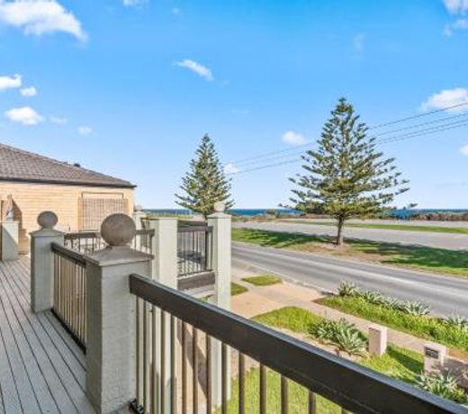 Beach Delight: A beach front home with scenic views
