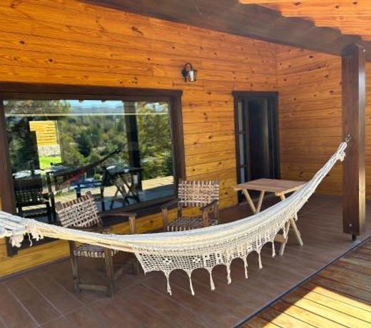 Casa y cabaÃ±a vista a las sierras