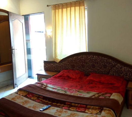 Harmony Palace by OYO Rooms