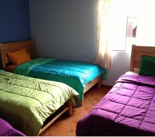 Mundo Albergue La Perla