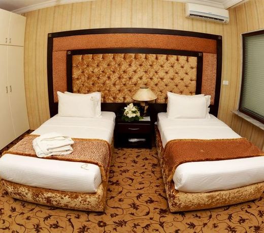 Queens Suite Hotel