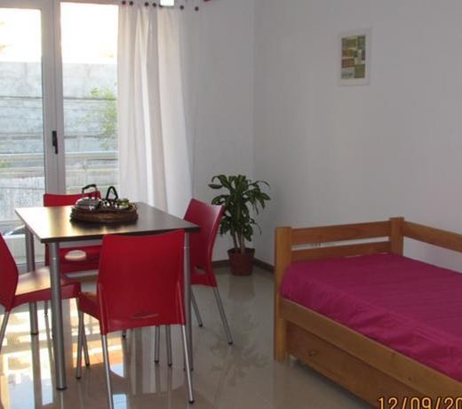 Departamentos Madryn - Calle Roca