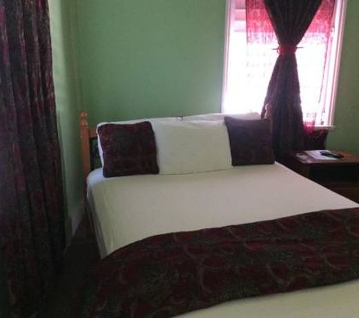 CARIBBEAN PALMS INN